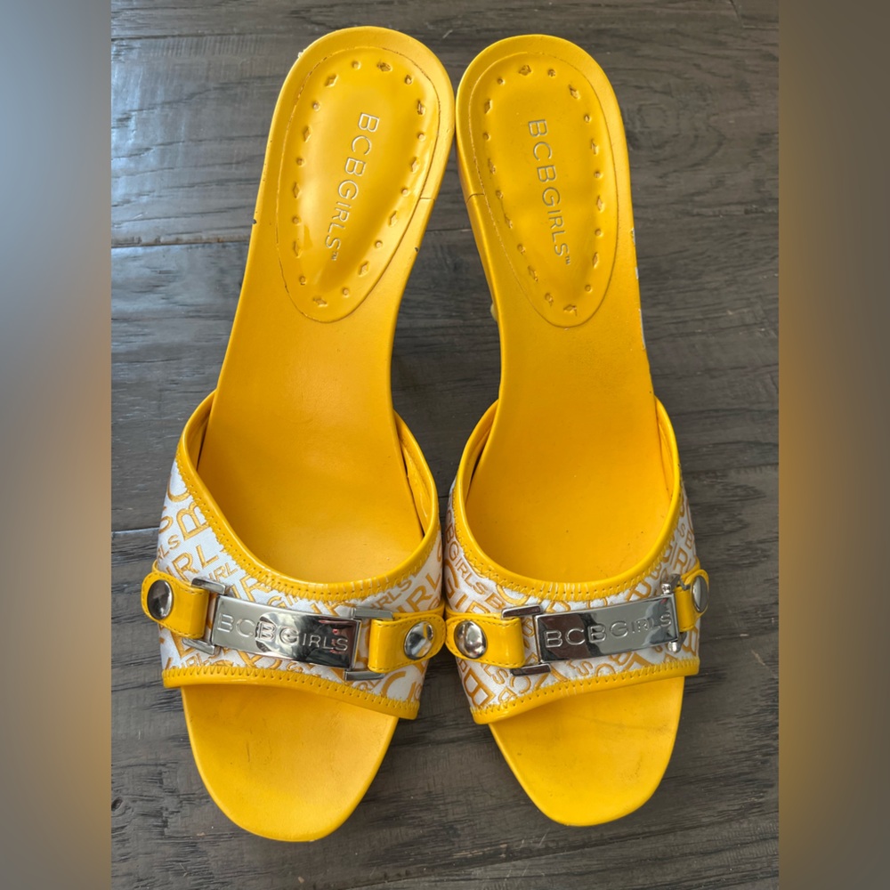 BCBGirls Yellow Logo Slide Mules with Silver Hardware